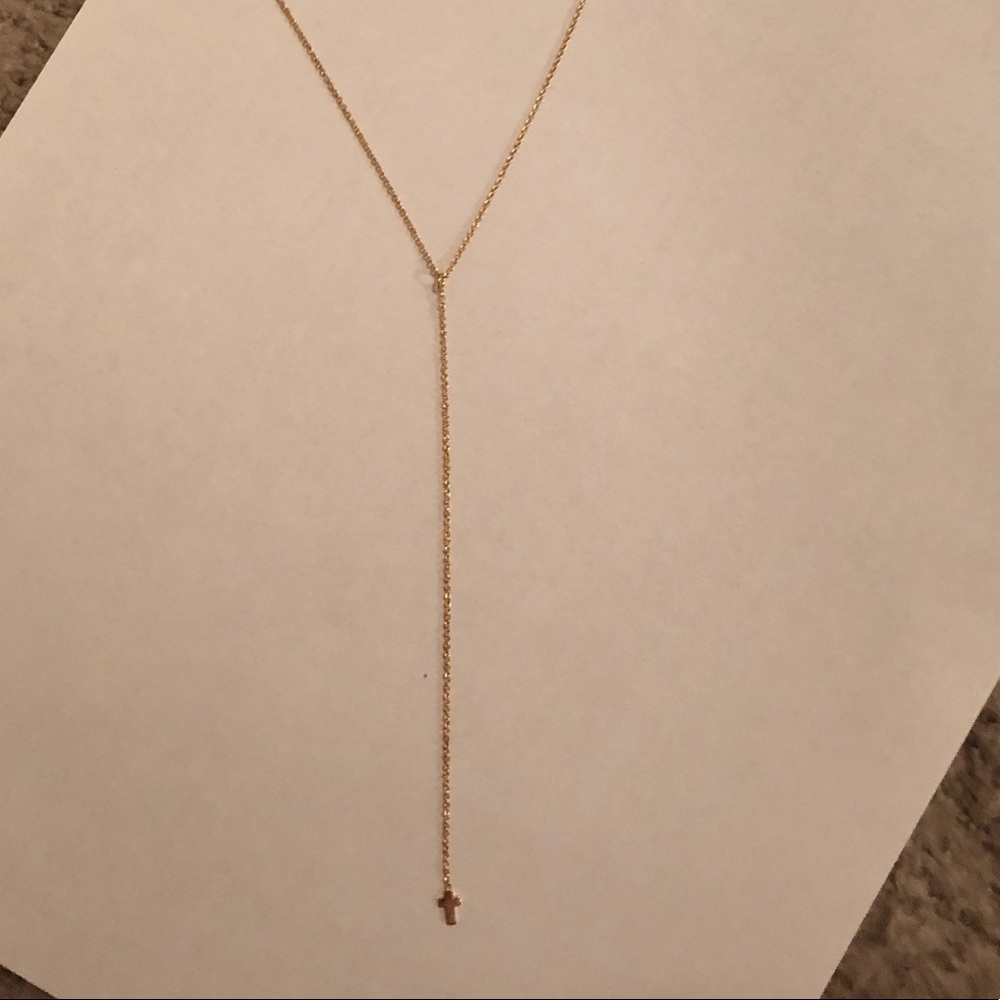 Gold necklace with cross